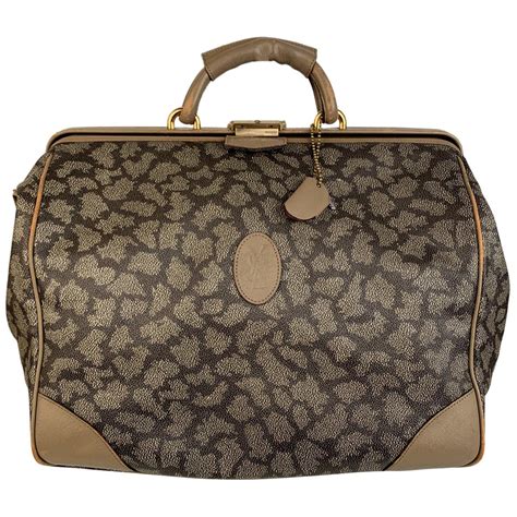 vintage ysl tan luggage compartment|yves st laurent handbags.